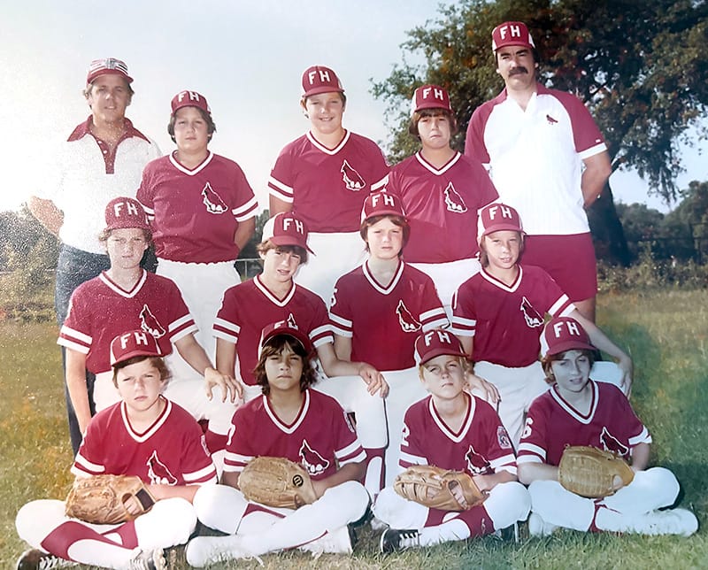 A Forest Hills Little League team photo from either the 1970s or 1980s, in which Ken Hagan and his father, Ken Sr., stand together.
