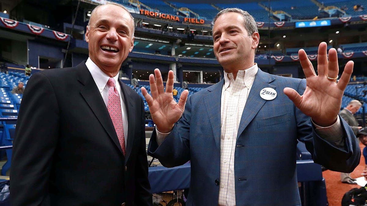Apr 3, 2016; St. Petersburg, FL, USA; Commissioner of baseball Rob Manfred talks with Tampa Bay Rays owner Stuart Sternberg prior to the game against the Toronto Blue Jays at Tropicana Field.