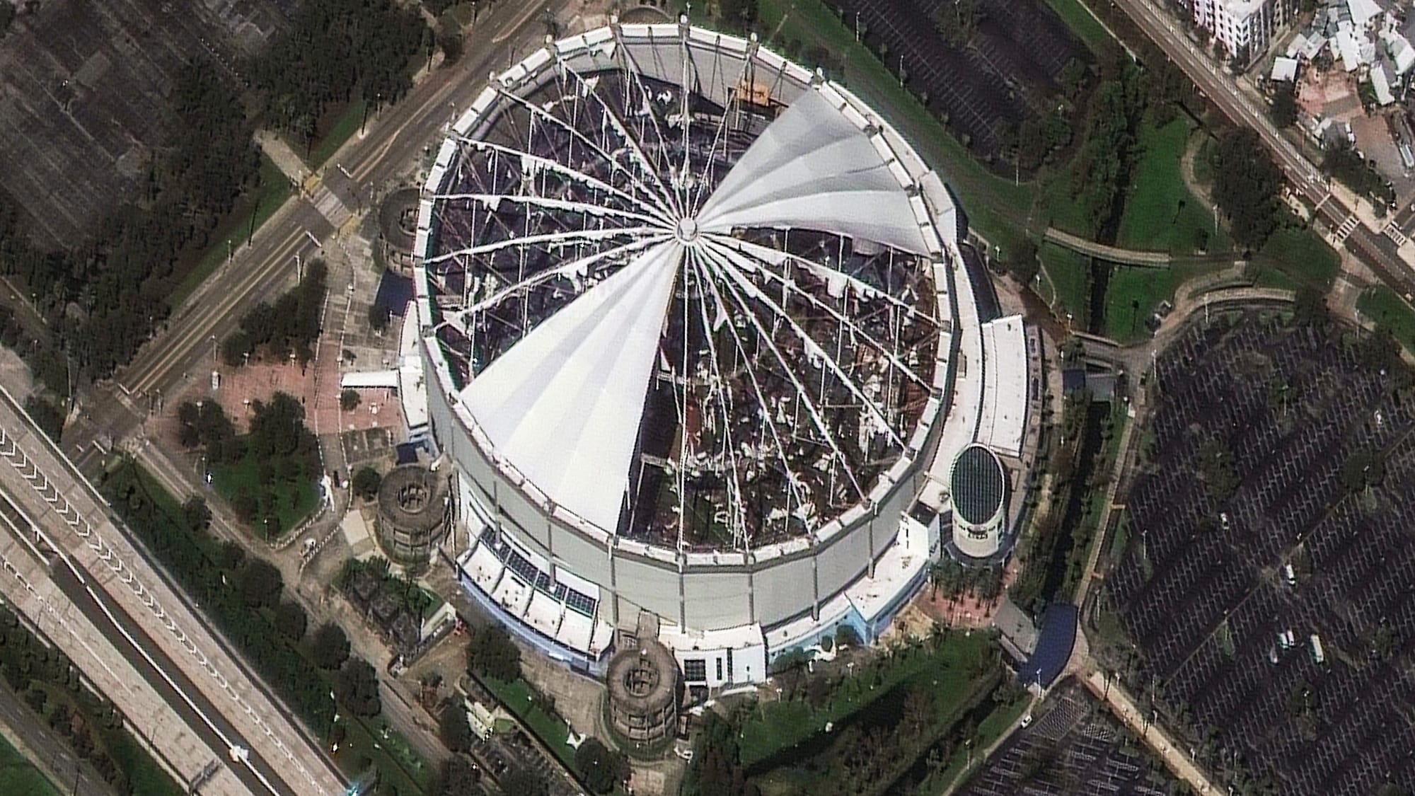 The roof of Tropicana Field, home of the Tampa Bay Rays MLB team, was torn off by Hurricane Milton's powerful winds. Satellite imagery from Maxar shows the destruction on Oct. 10, 2024. Prior to landfall, the stadium was converted into a base camp for emergency responders.