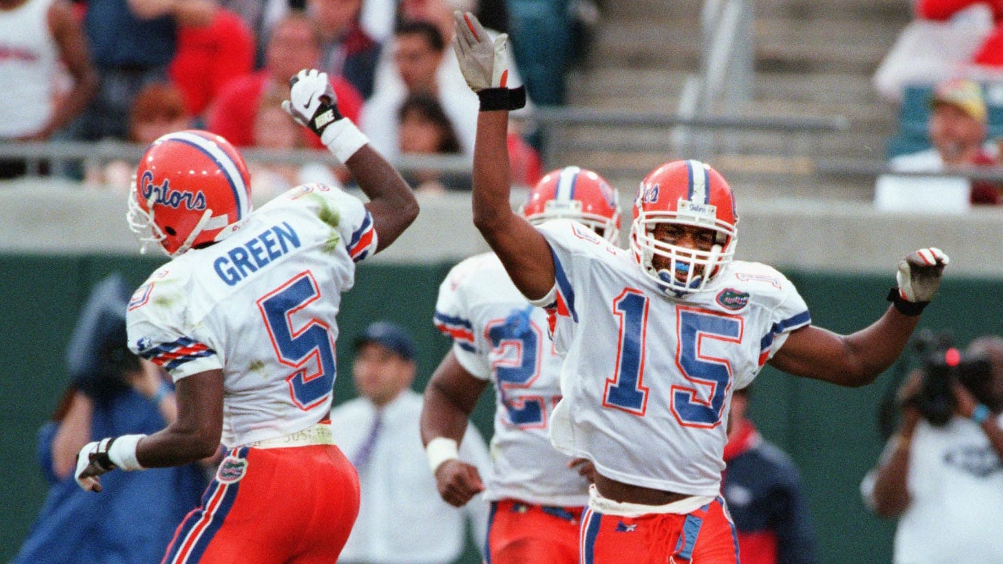 Florida Gators wide receivers Jacquez Green (5) and Reidel Anthony (15) celebrate a Gators touchdown against Georgia during the first quarter of college football at Jacksonville Municipal Stadium on Nov. 2, 1996