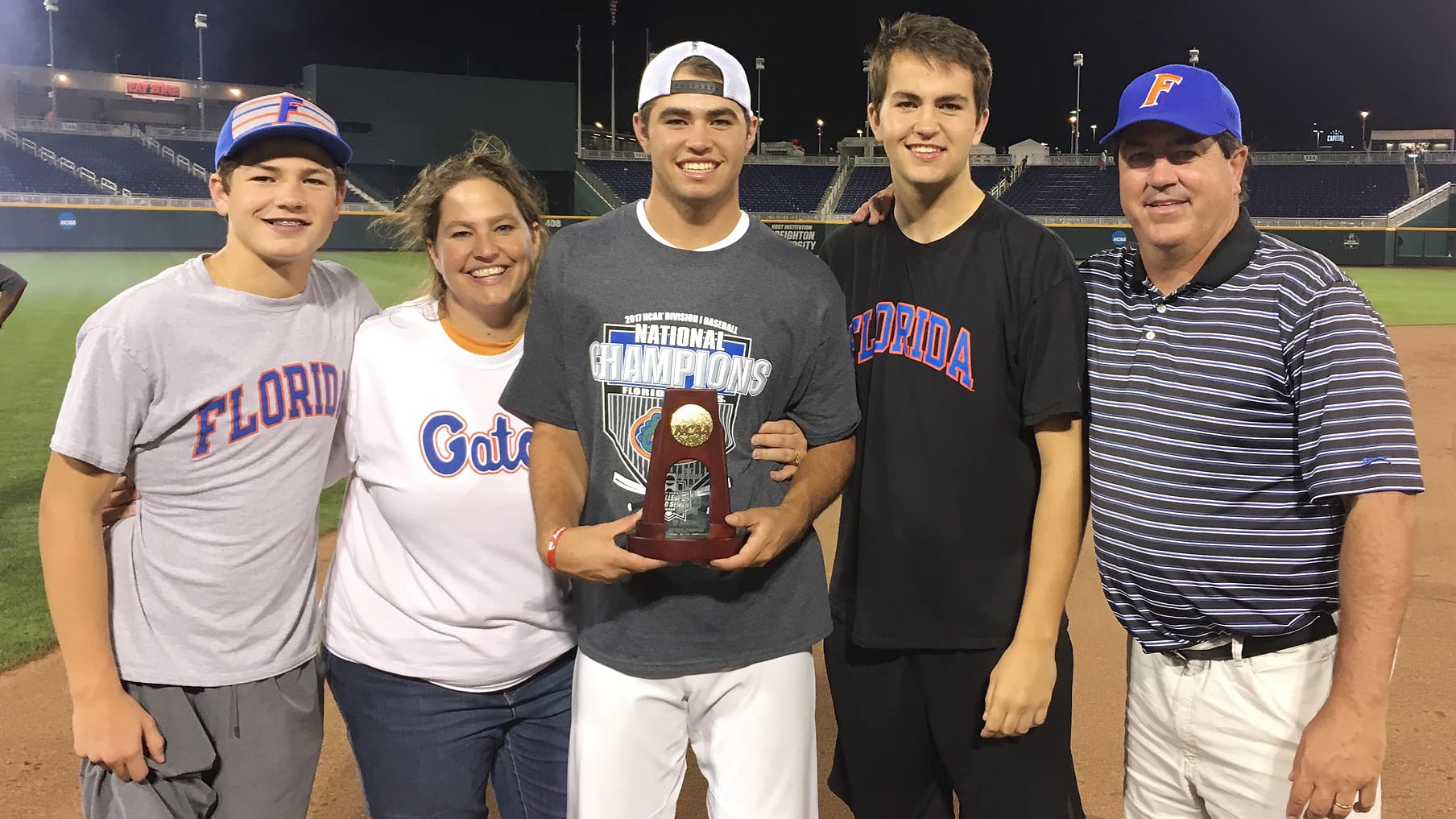 Drake, Aimée, Cole, Beau and Mark Maye celebrate in Omaha, Nebraska, after Florida baseball's victory at the 2017 College World Series in June.