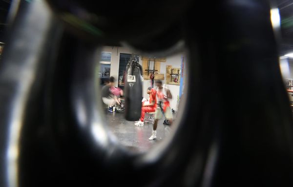 A youth boxer hits a punching bag in Galaxxy Boxing Refuge in Jacksonville on April 23.
