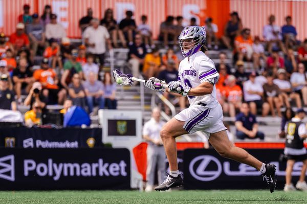 Philadelphia Waterdogs lacrosse defender Dylan Hess runs with the ball during a PLL game in 2024.
