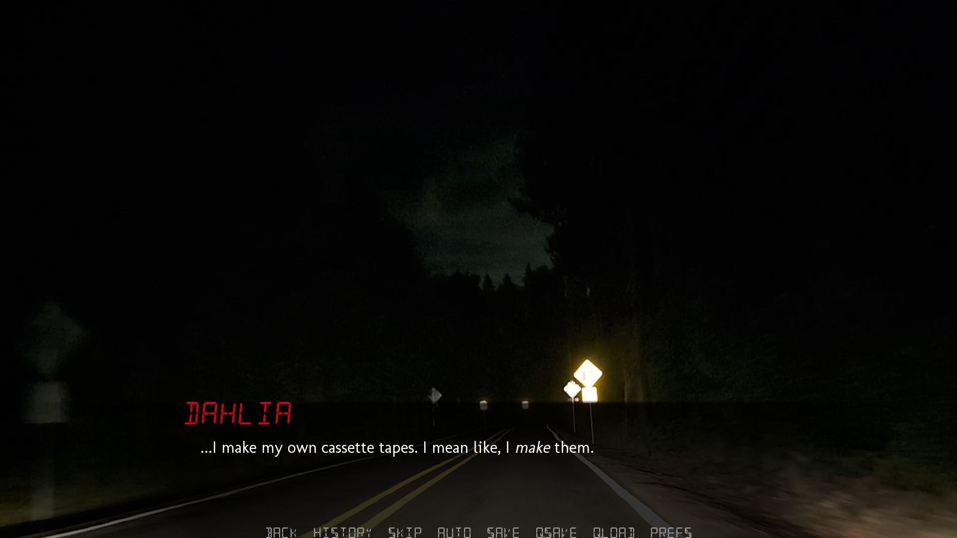A screenshot from Ride Home depicting a the view from the front seat of a car driving down a dark road at night, with the way ahead lit only by headlights. On screen, dialogue from DAHLIA reads, "...I make my own cassette tapes. I mean like, I make them."