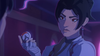 A 2D illustration of Anran shows her holding a chip in her hand and giving a smug look. She has tilted eyes, strong eyebrows, a downturned mouth, and a slightly pointy nose.