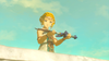 Princess Zelda holds the broken Master Sword in both hands, gazing down at it thoughtfully.