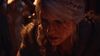 A close-up on Ciri's face from The Witcher 4 debut trailer. She has her long silver hair in a braid and has thick black eyeliner around her eyes.