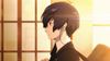 The protagonist of Persona 3 Reload walking by a sunlit window. They have a school backpack on and headphones in their ears.