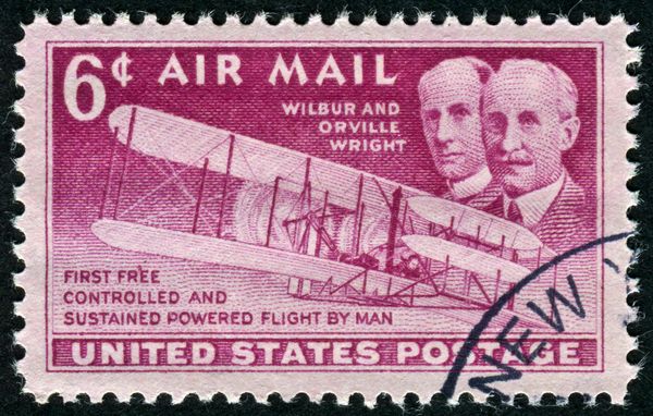 US Air Mail stamp featuring the Wright Brothers and their airplane