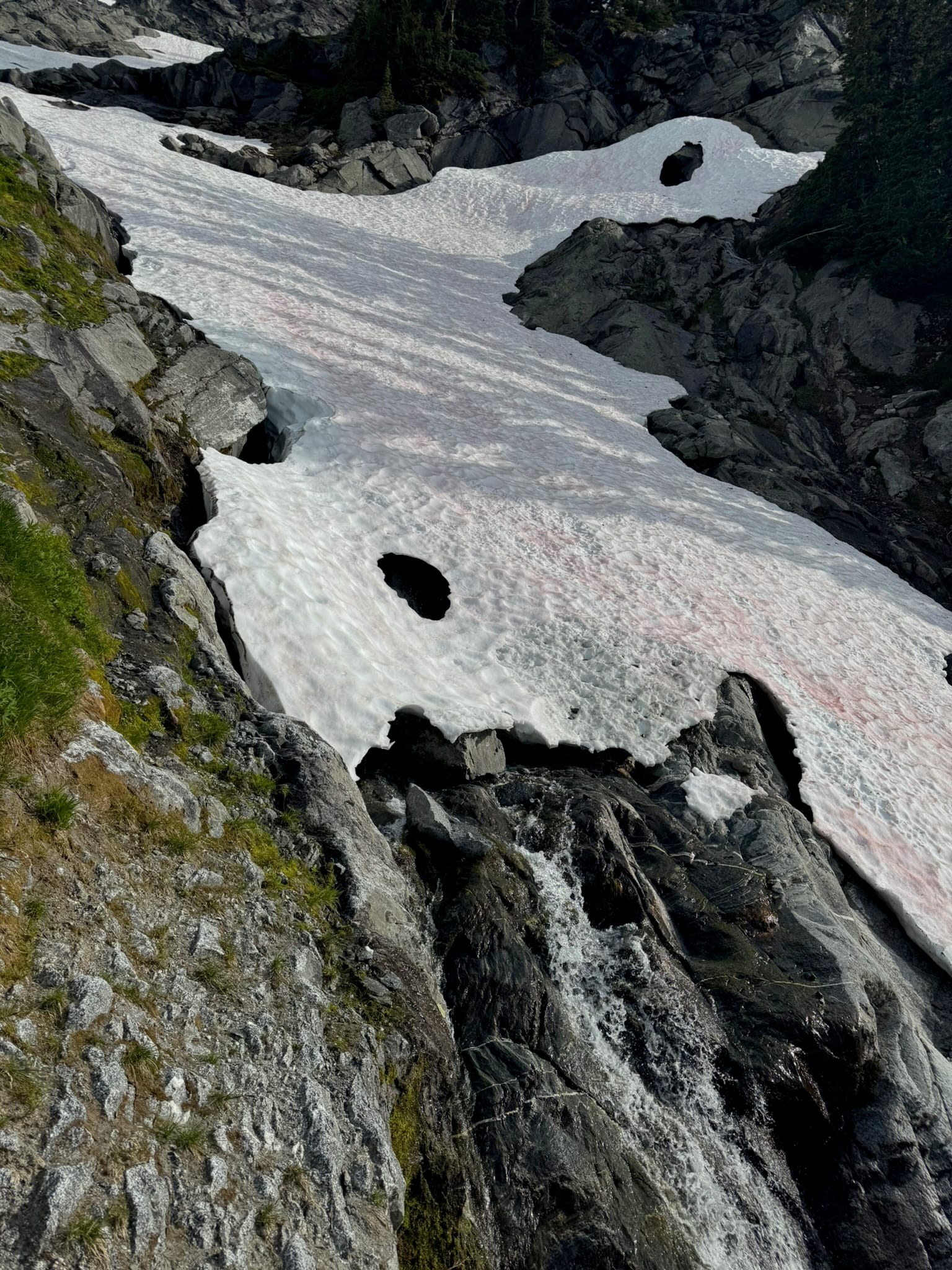This snow bridge and creek look HUNGRY.