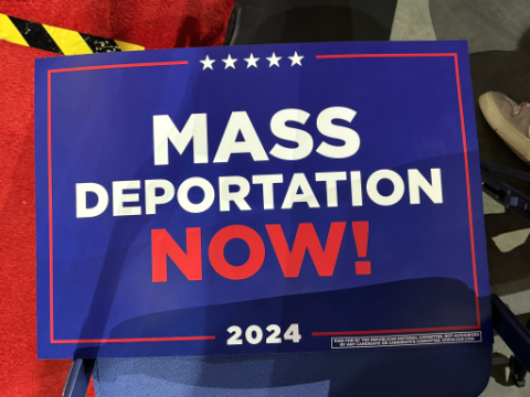 Photo of a “Mass Deportation Now” sign distributed at the 2024 Republican National Convention. 