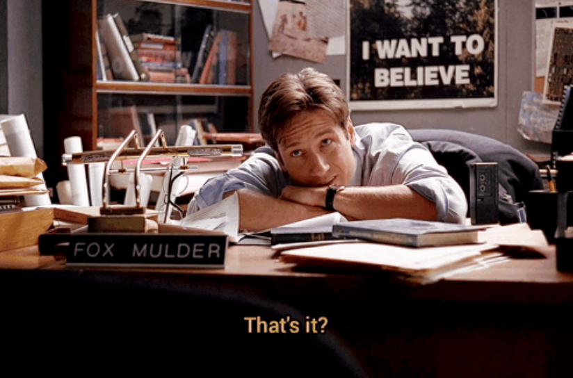 Screenshot of Fox Mulder of the X-Files in his office with his head on his desk, looking up, and asking "That's it?"