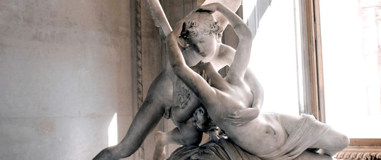 marble sculpture of two figures embracing