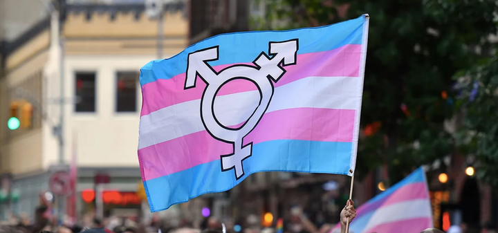 A transgender pride flag flies over a rally to mark the 50th anniversary of the Stonewall Riots in New York City on June 28, 2019.