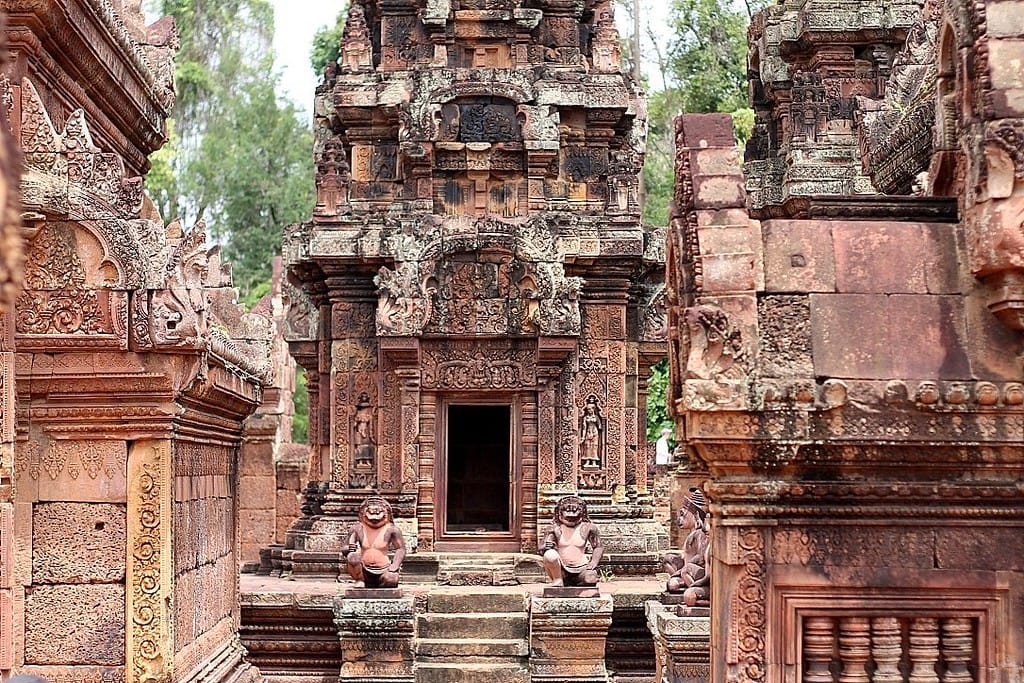Intricate pink sandstone carvings at Banteay Srei temple, the Citadel of the Women, near Angkor