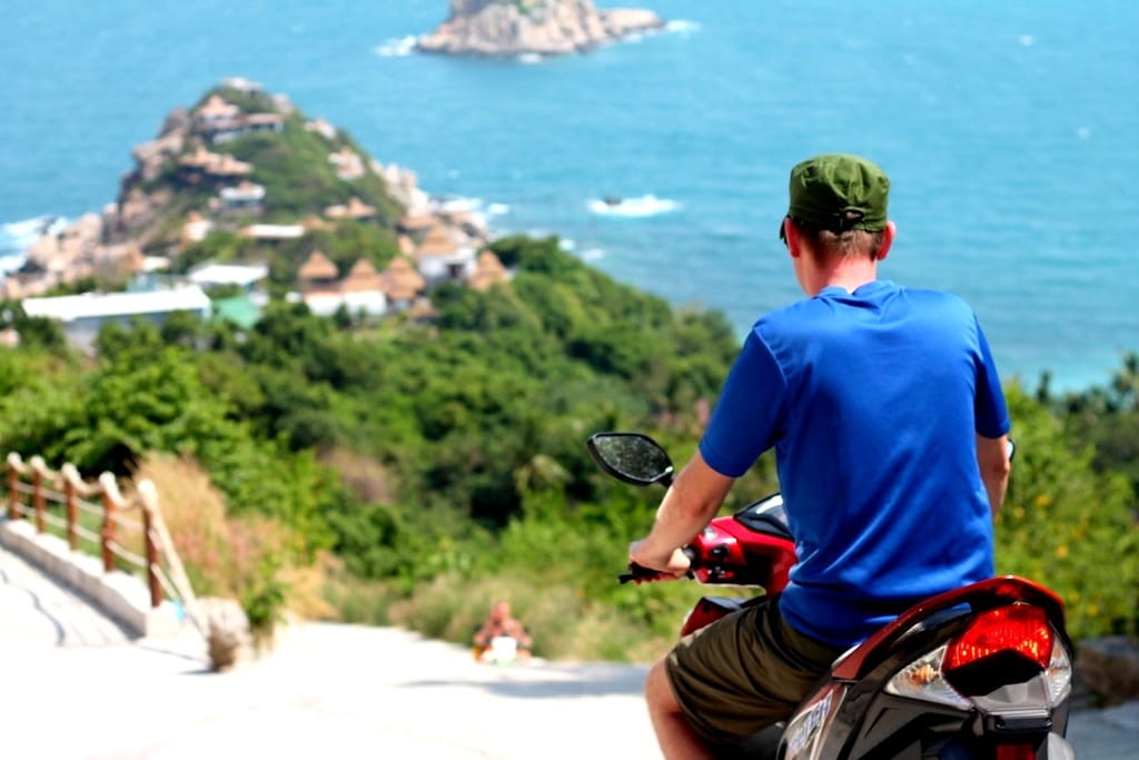 Exploring the scenic roads of Koh Tao island on a rented scooter in Thailand