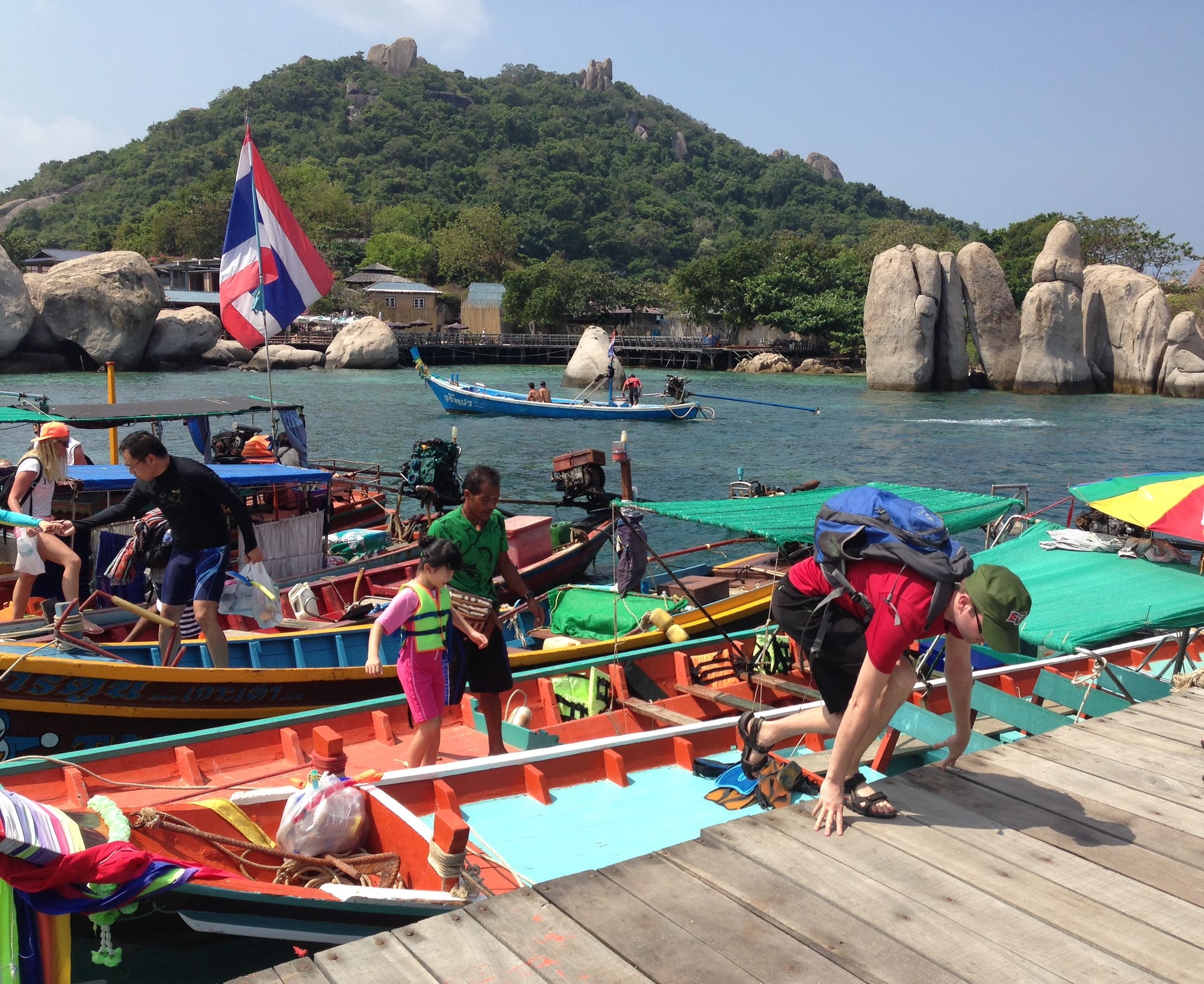 Arriving at Koh Nang Yuan Island with boats moored at the small harbour