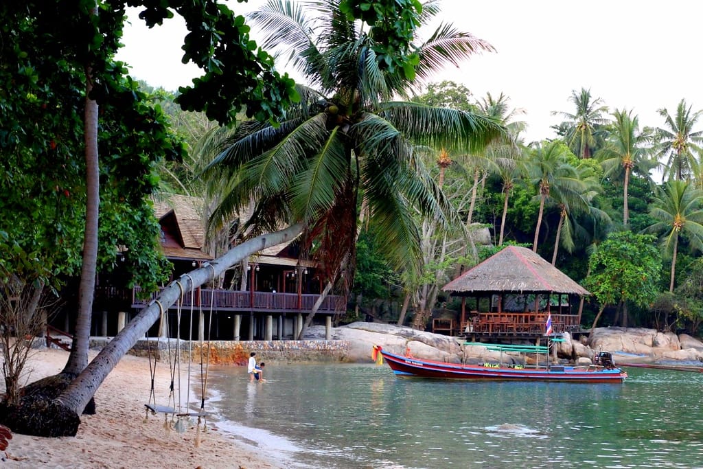 Stunning tropical view of Koh Tao island coastline and lush green hills