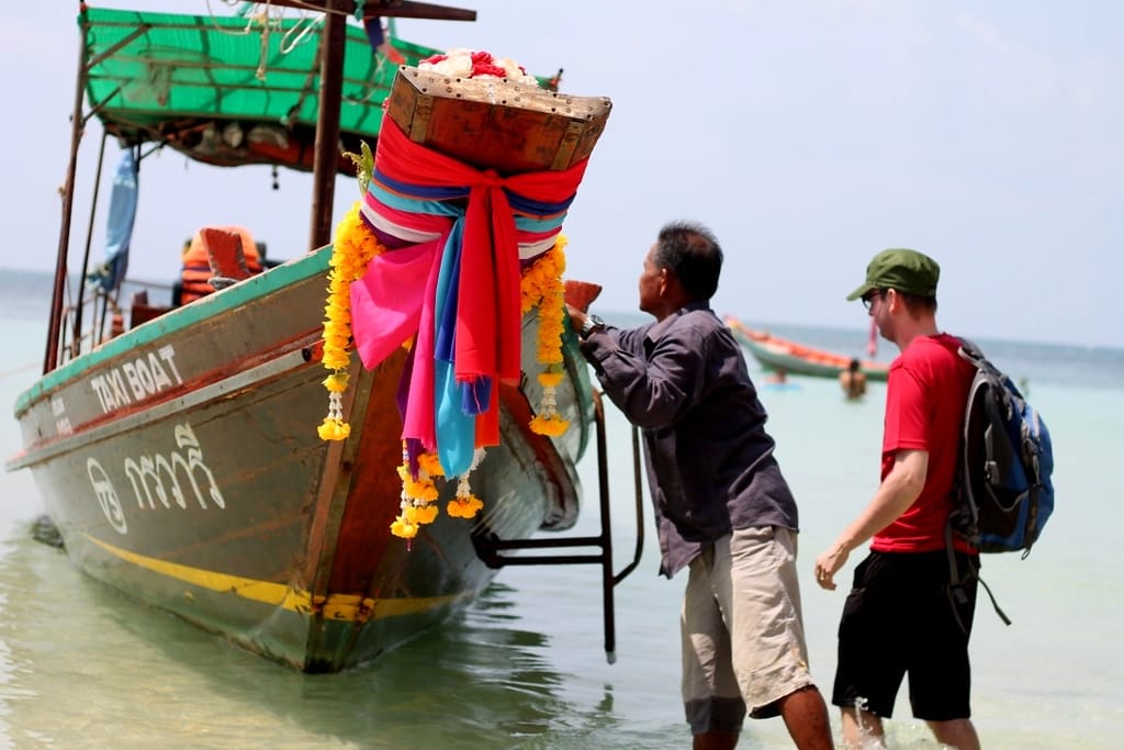 Longtail taxi boat moored at the harbour in Koh Tao ready for Koh Nang Yuan trip