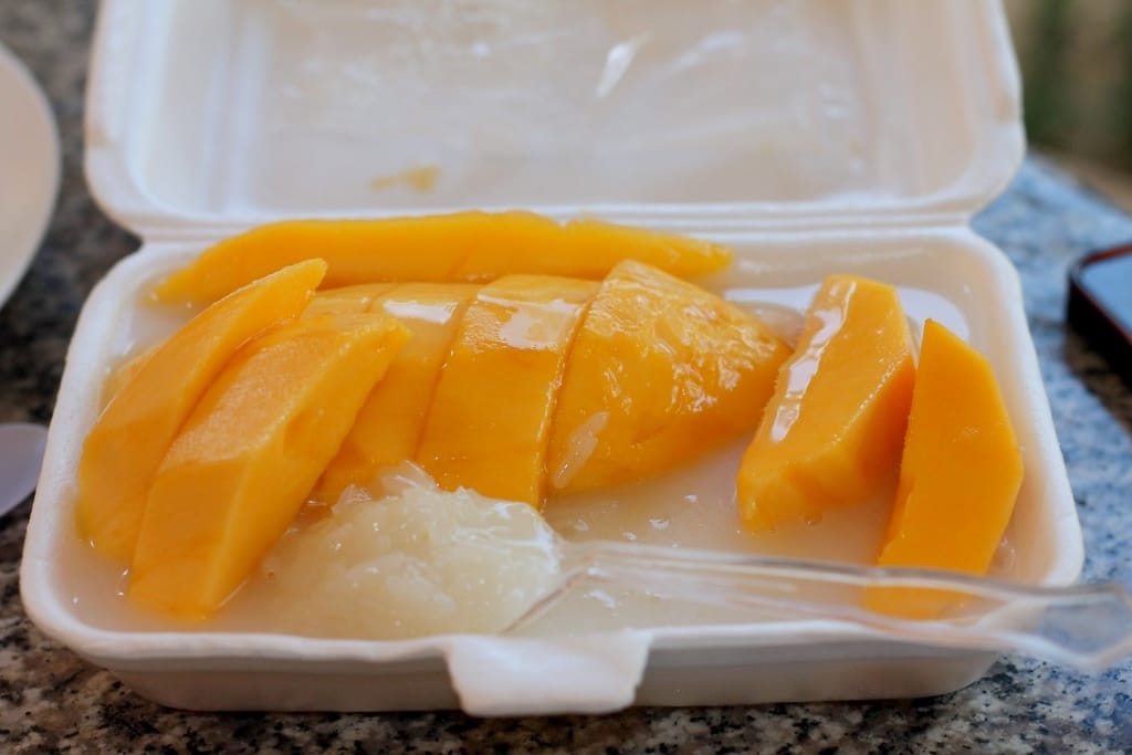 Thai mango sticky rice dessert from local food stalls near Thung Wua Laen Beach