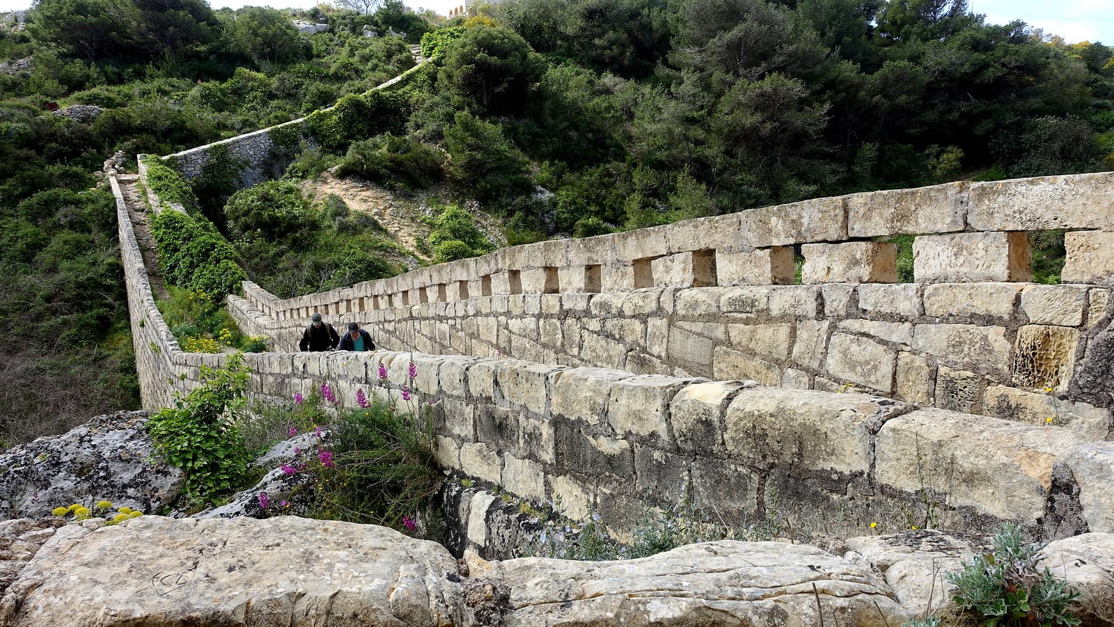 The ancient stone walls of the Dwejra Lines section of the Victoria Lines Malta trail