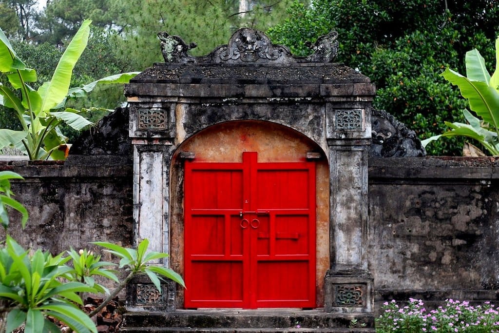 Ornate gateway entrance to the Tu Duc Imperial Tomb in Hue, Vietnam
