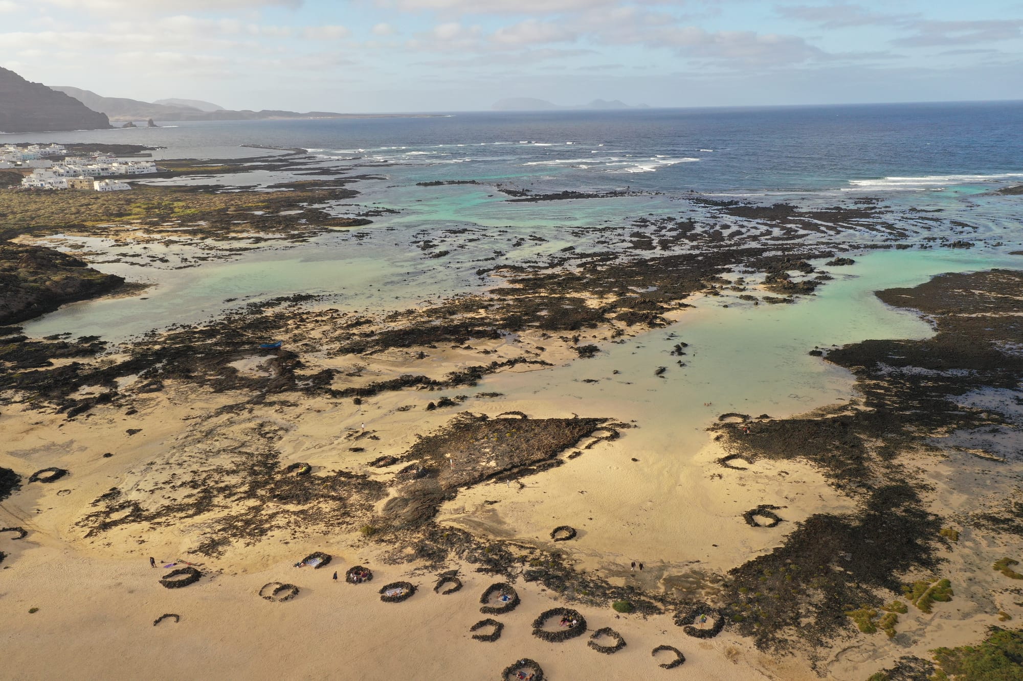 Aerial view of the Mirador del Rio overlooking La Graciosa and the turquoise waters below — Lanzarote