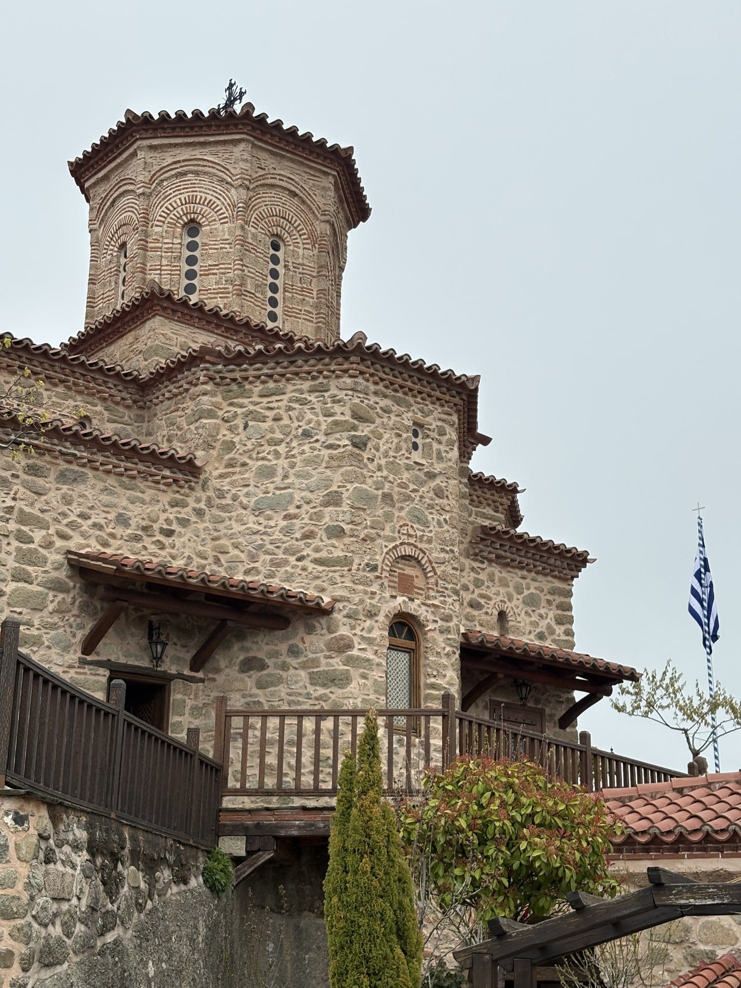 Byzantine brick and stone dome of a Meteora monastery chapel — Greece