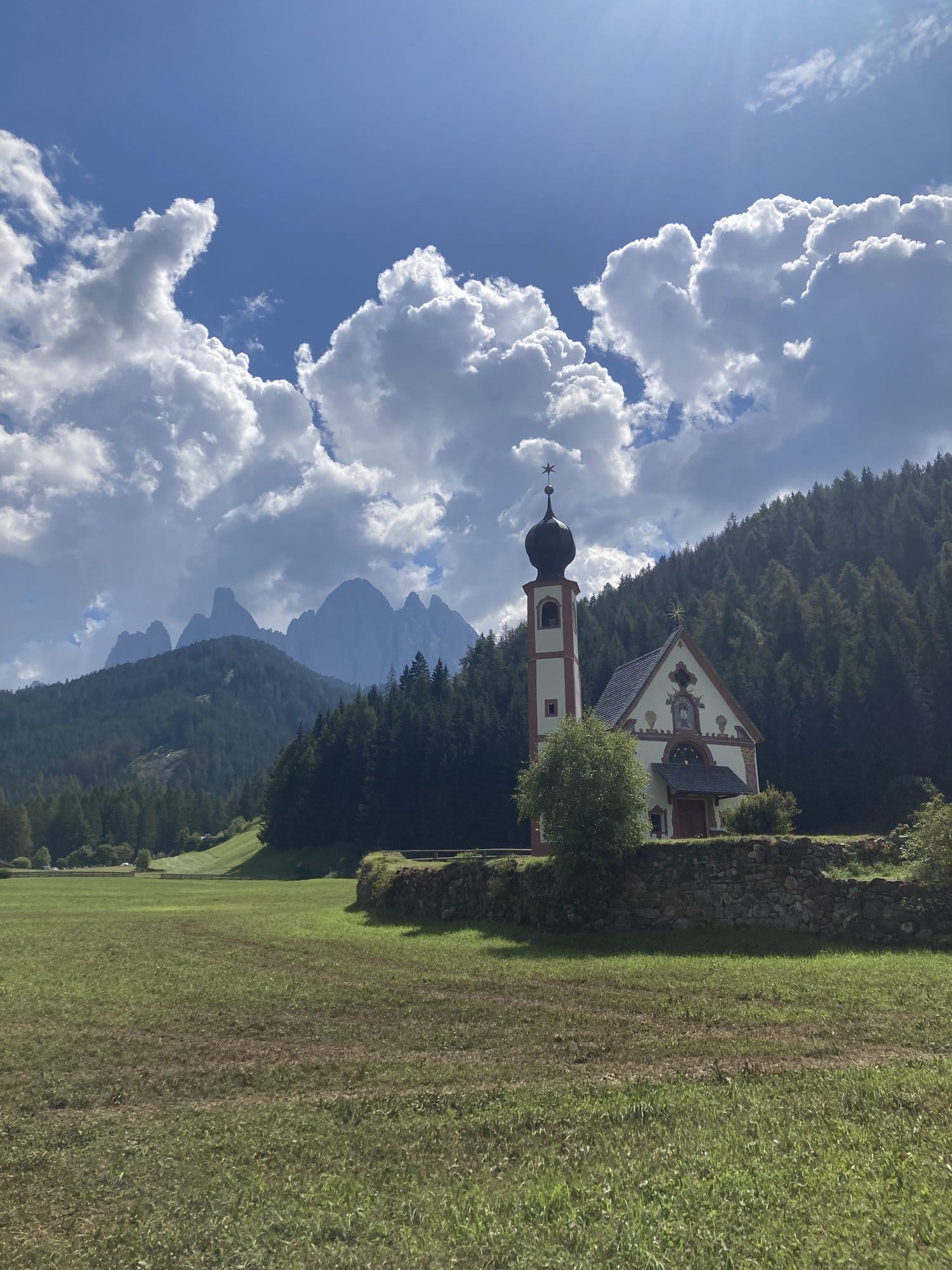 Chiesa di San Giovanni in Ranui with the Odle peaks rising behind โ Val di Funes, Dolomites