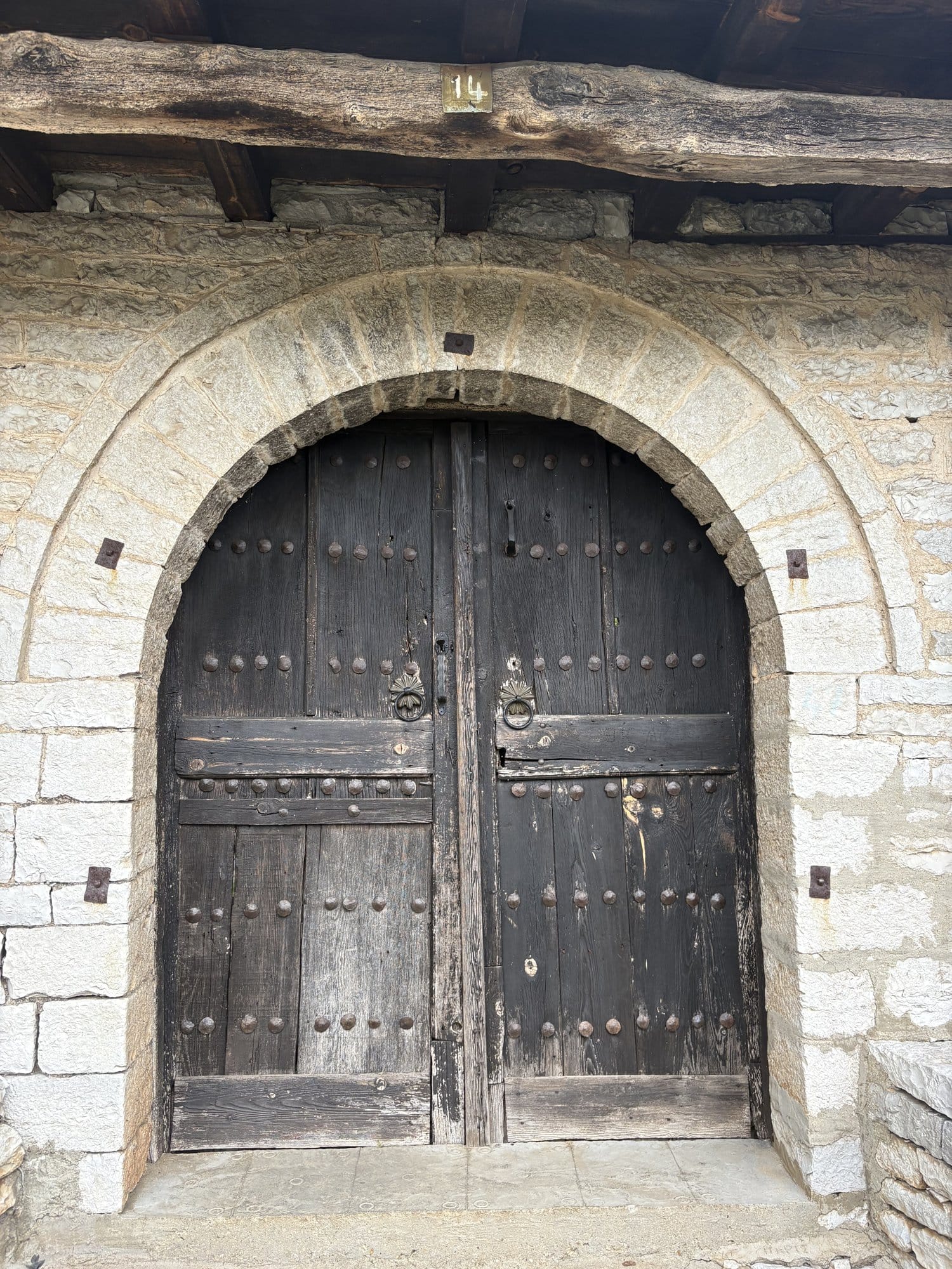 Stone street in Monodendri village with a plane tree — Zagori, Greece