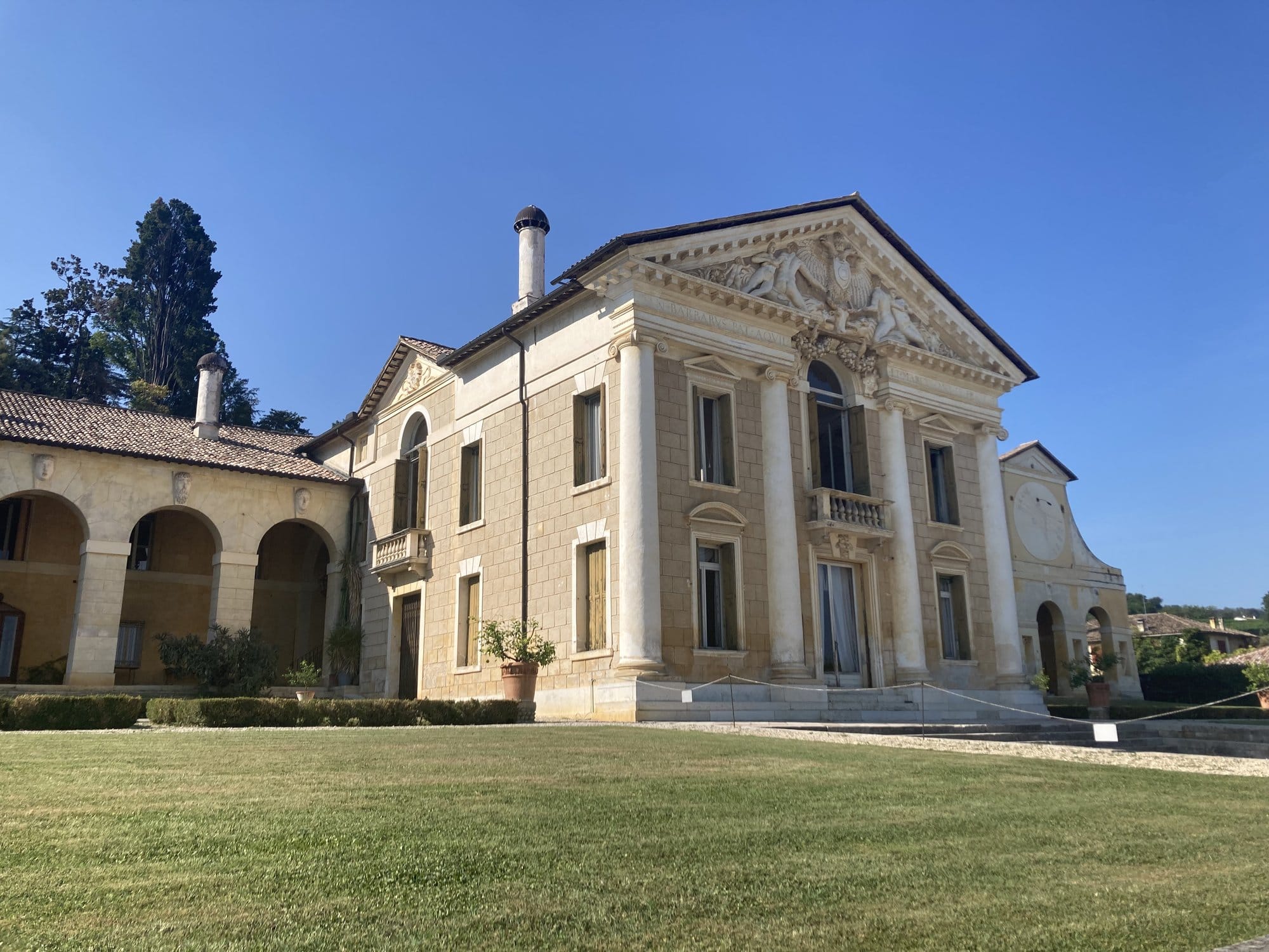 Villa Barbaro's Palladian facade with neoclassical pediment and manicured lawns — Maser, Italy