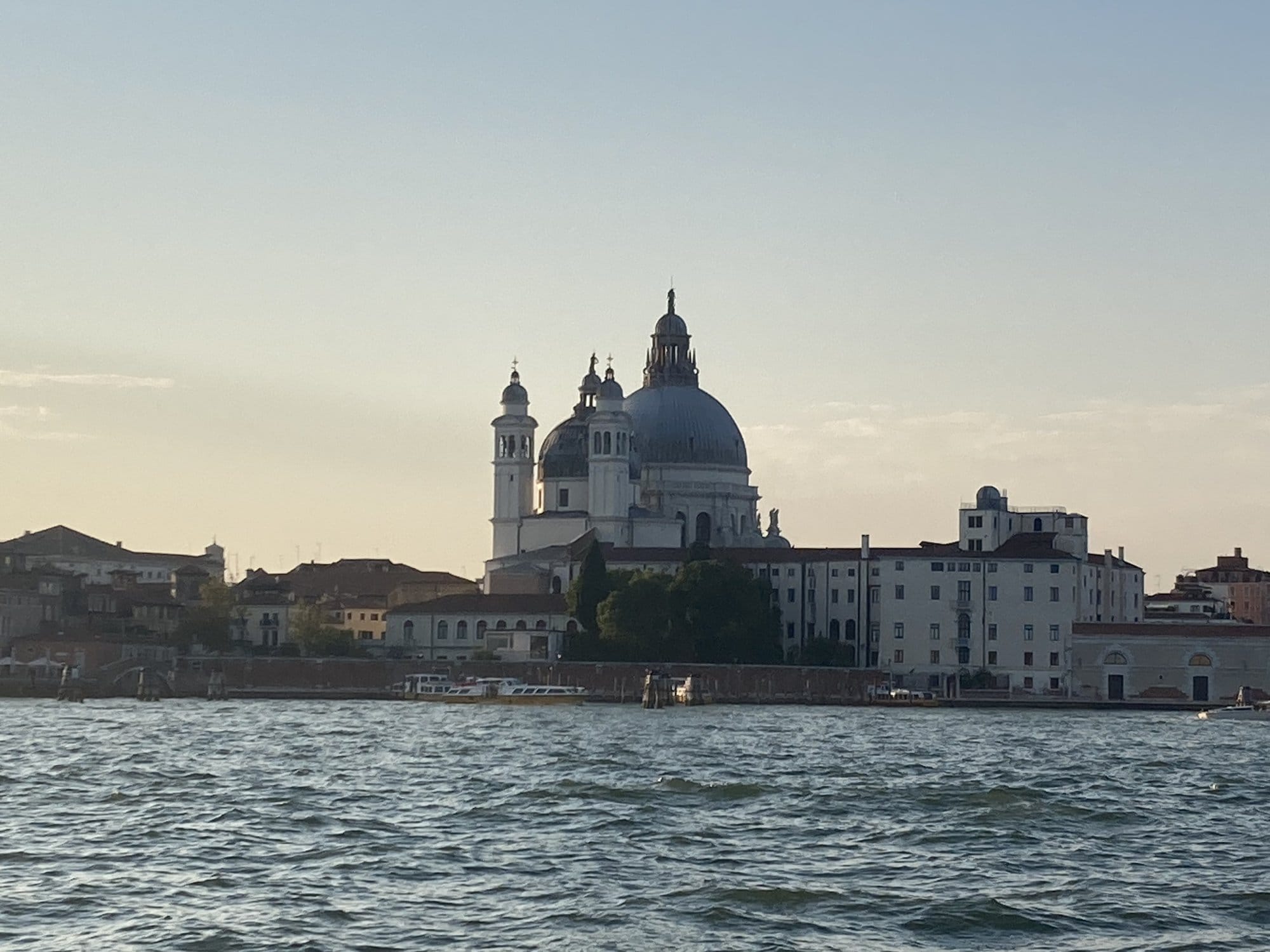 Basilica della Salute seen from the water at golden hour — Venice, Italy