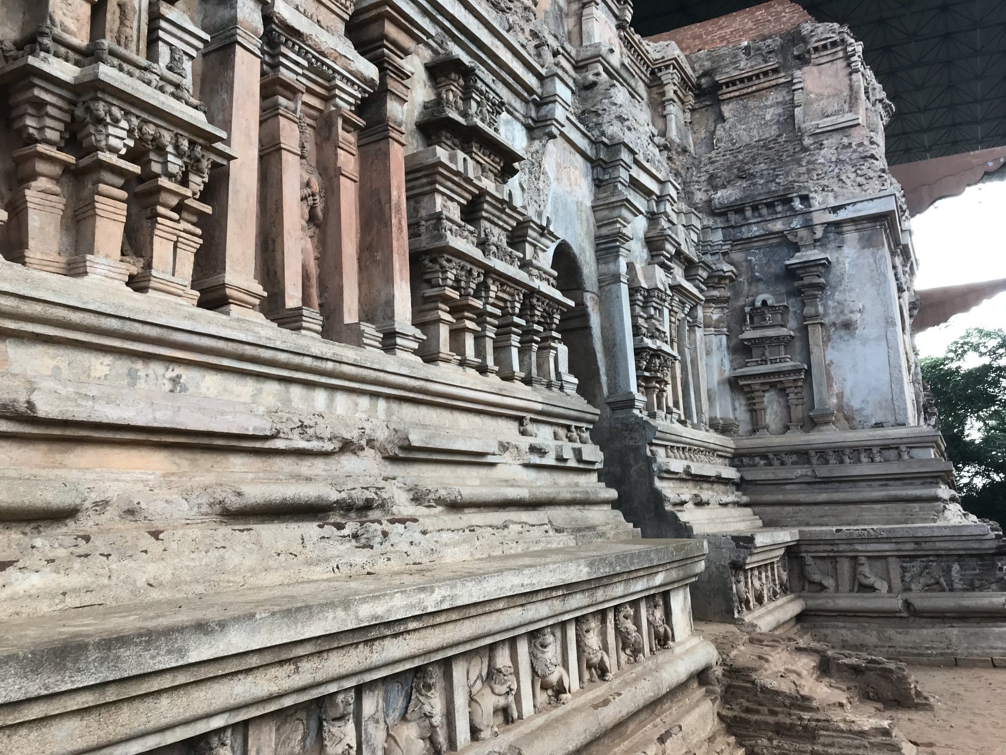 Ornately carved stone doorway with intricate pillars and architectural details from Polonnaruwa's temple complex — Polonnaruwa, Sri Lanka