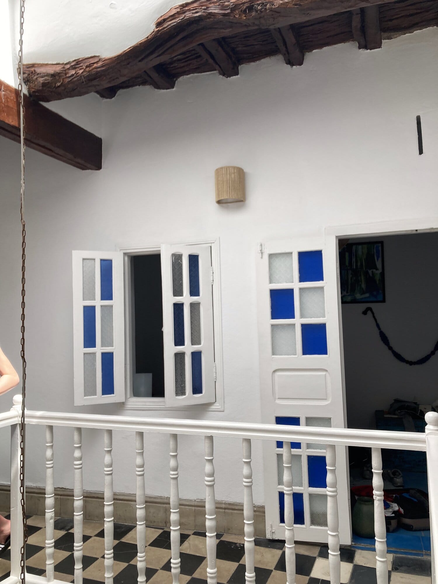 A riad terrace overlooking a pool and ochre kasbah-style walls — Essaouira, Morocco