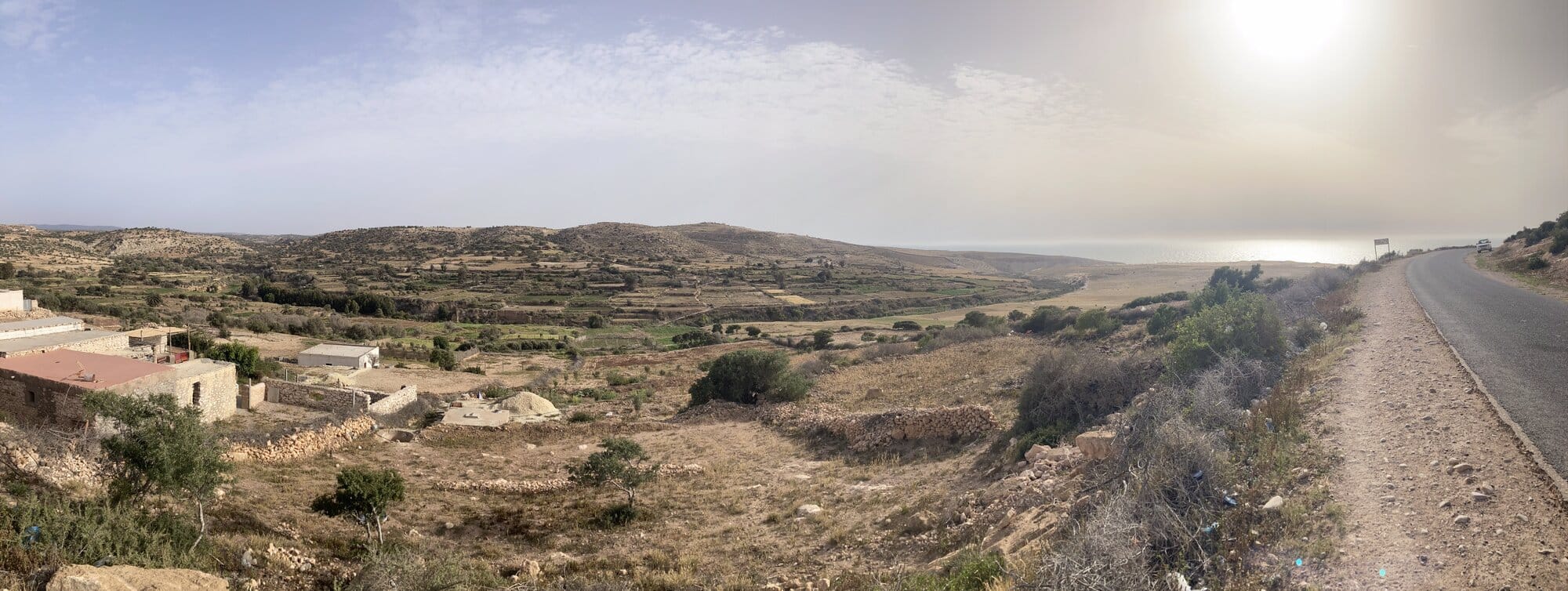 The vast sweep of Sidi Kaouki beach with its dunes and Atlantic haze — Sidi Kaouki, Morocco