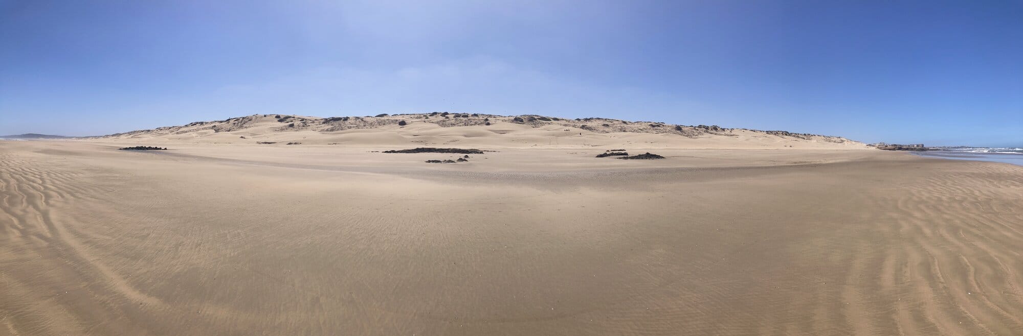 The huge wind-sculpted dunes behind Diabat beach on the way to the Atlantic — Diabat, Morocco