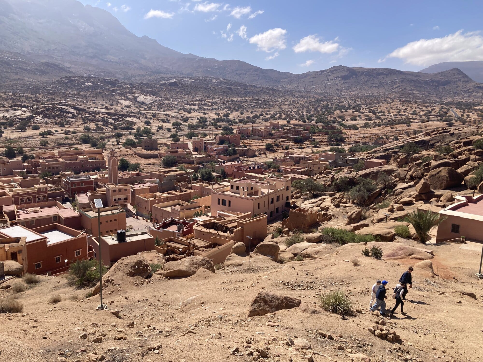 A hilltop view over Tafraout with the rocky ridges of the Anti-Atlas fanning out into the distance — Tafraout, Morocco