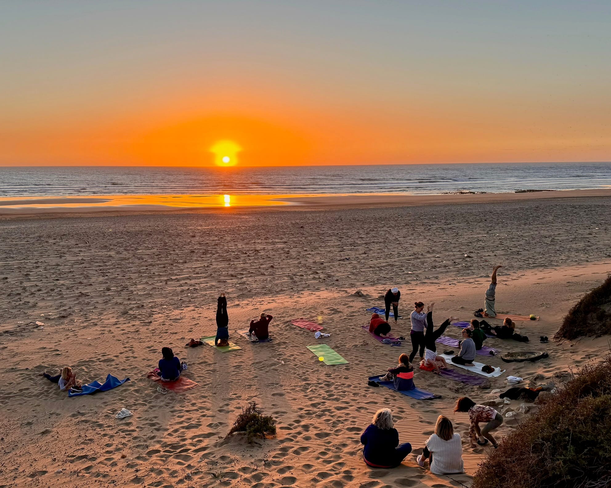 The ruined marabout shrine half-buried in the dunes above the beach at Smimou — Smimou, Morocco