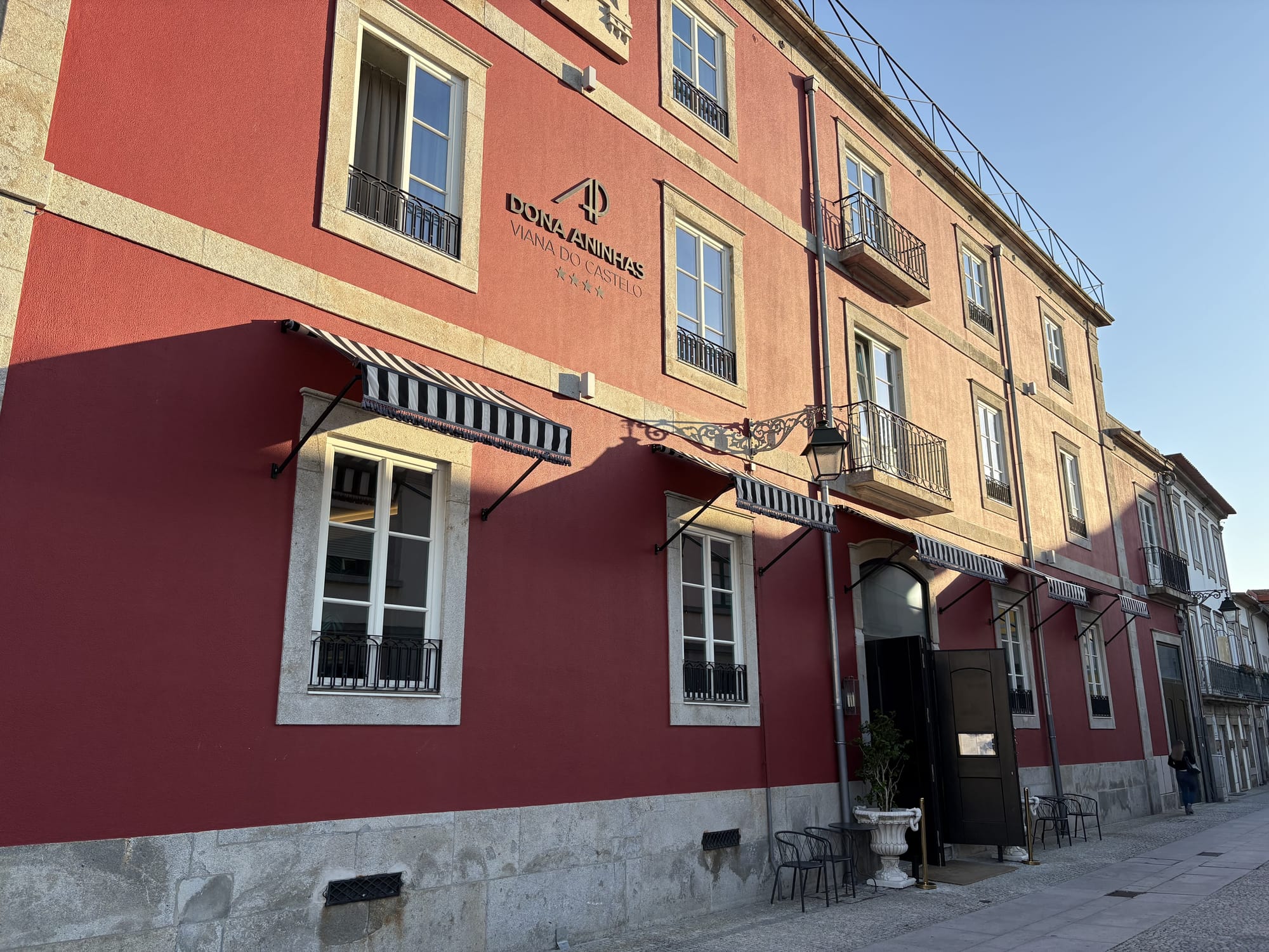 Colorful red and yellow historic facade in Viana do Castelo's old town — Viana do Castelo, Portugal