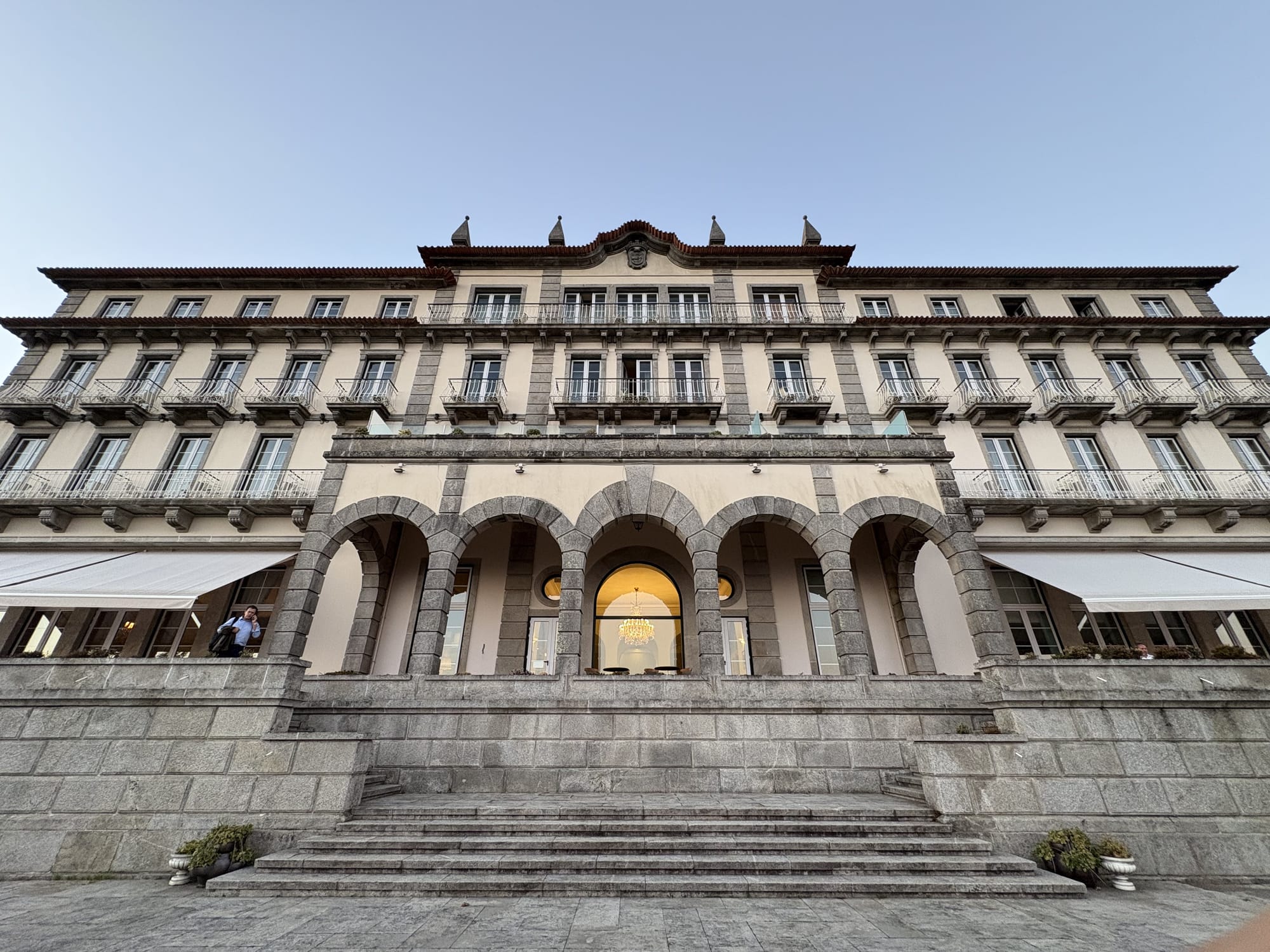Pousada monumental staircase and arcades at dusk — Monte Santa Luzia, Viana do Castelo