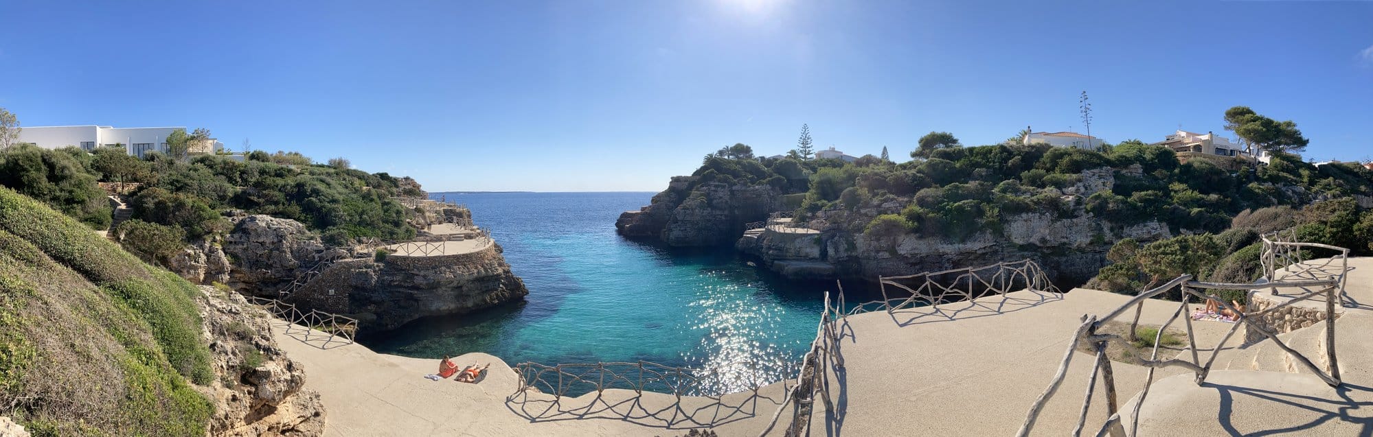 Beach cove with wooden stairs — Ciutadella, Spain