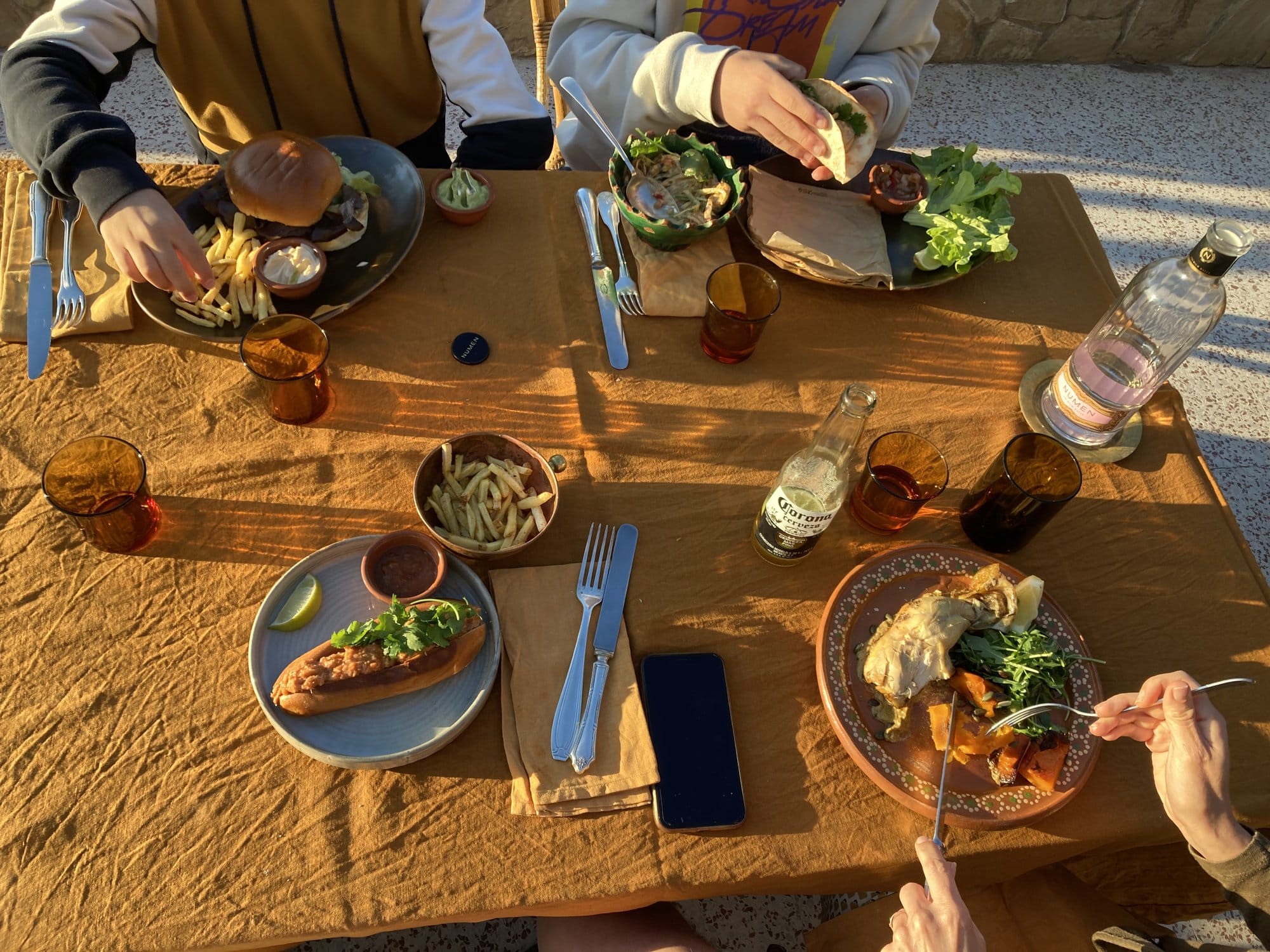 Overhead dinner table with plated dishes — Ibiza, Spain