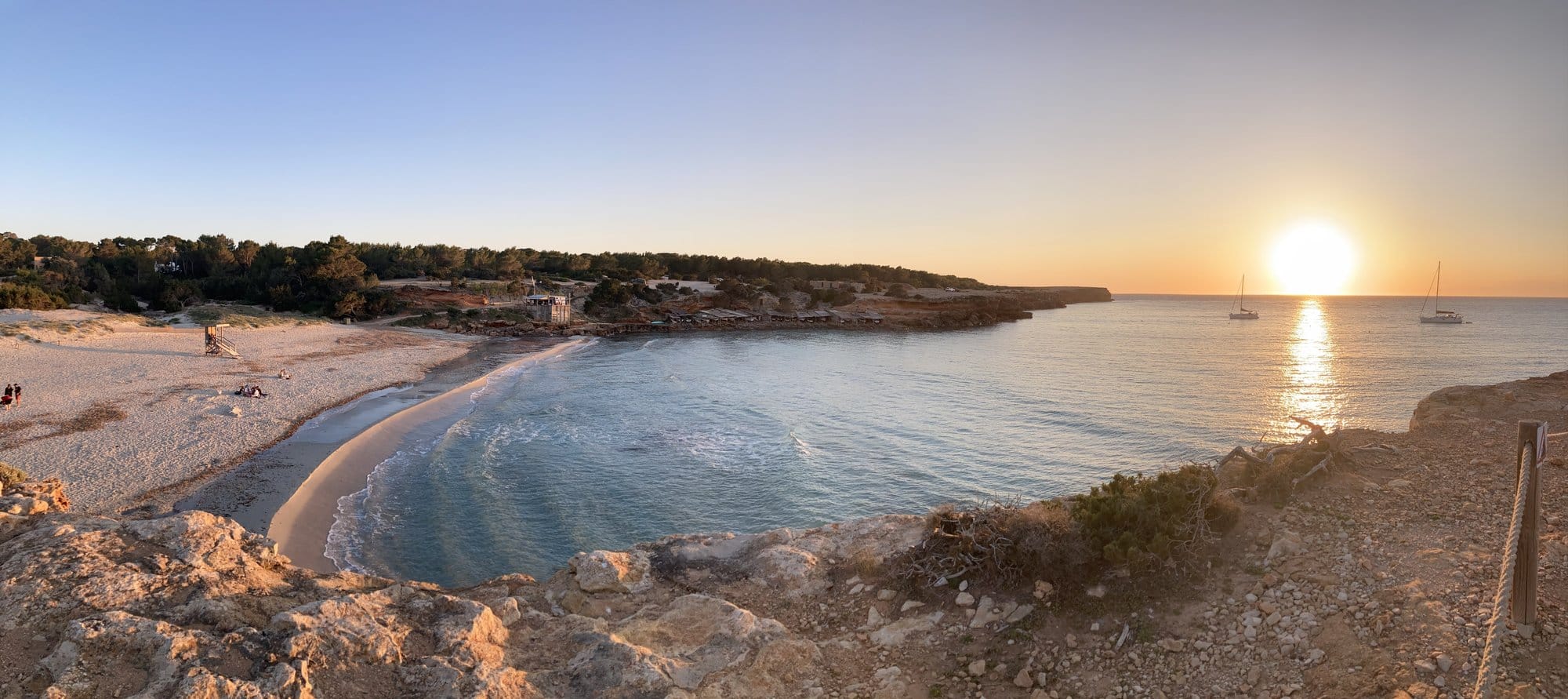 Beach cove sunset turquoise water — Formentera, Spain