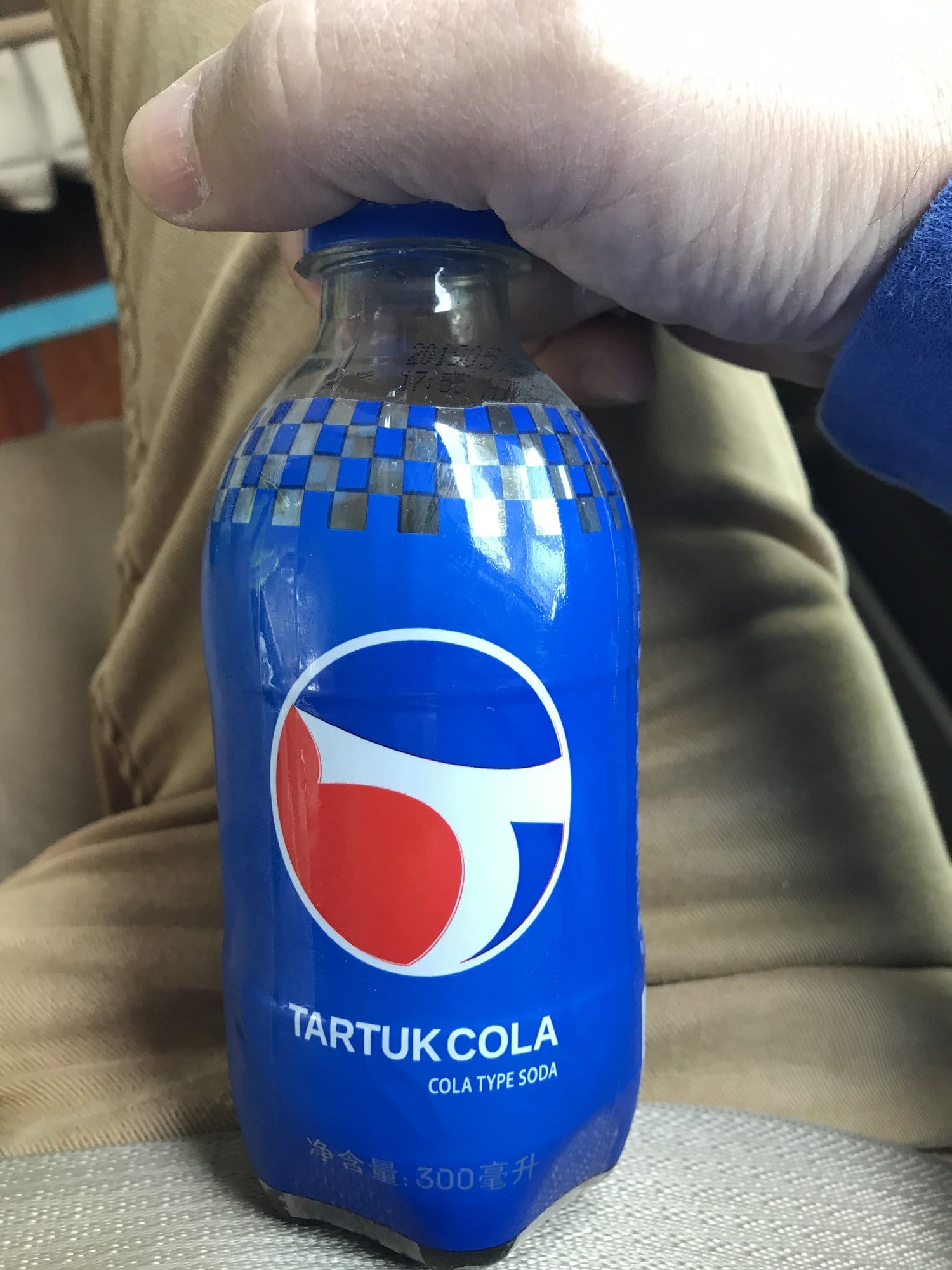 A bottle of Tartuk Cola, the local cola, bought at a roadside stop on the way up.