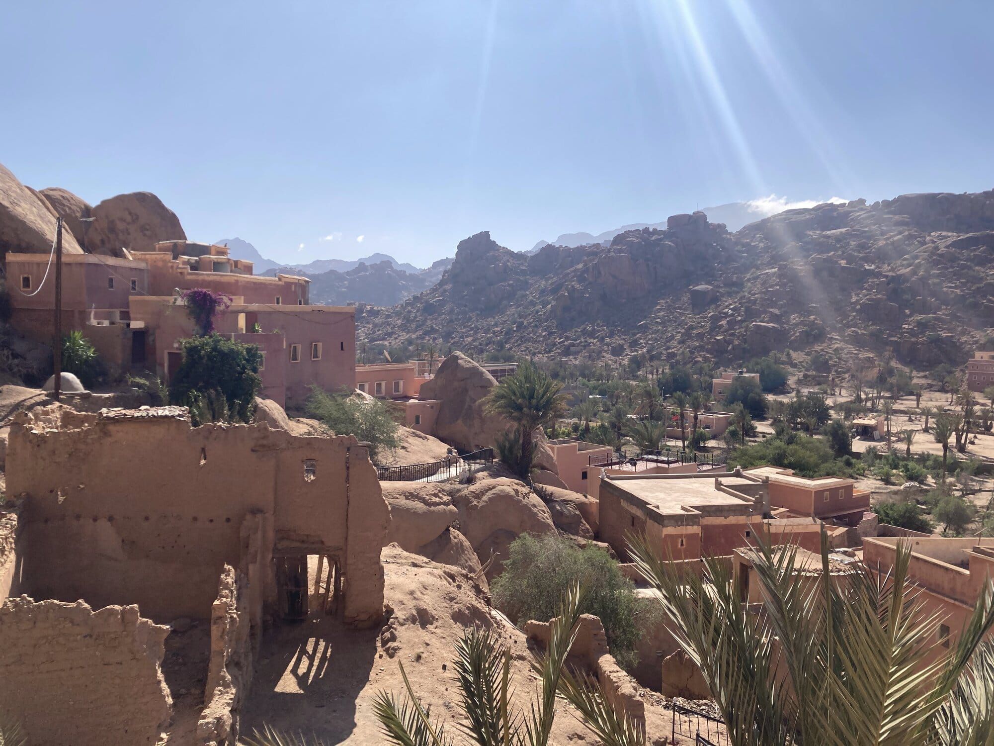 Classic Tafraout panorama — the pink-ochre town cupped between the giant granite peaks of the Anti-Atlas — Tafraout, Morocco