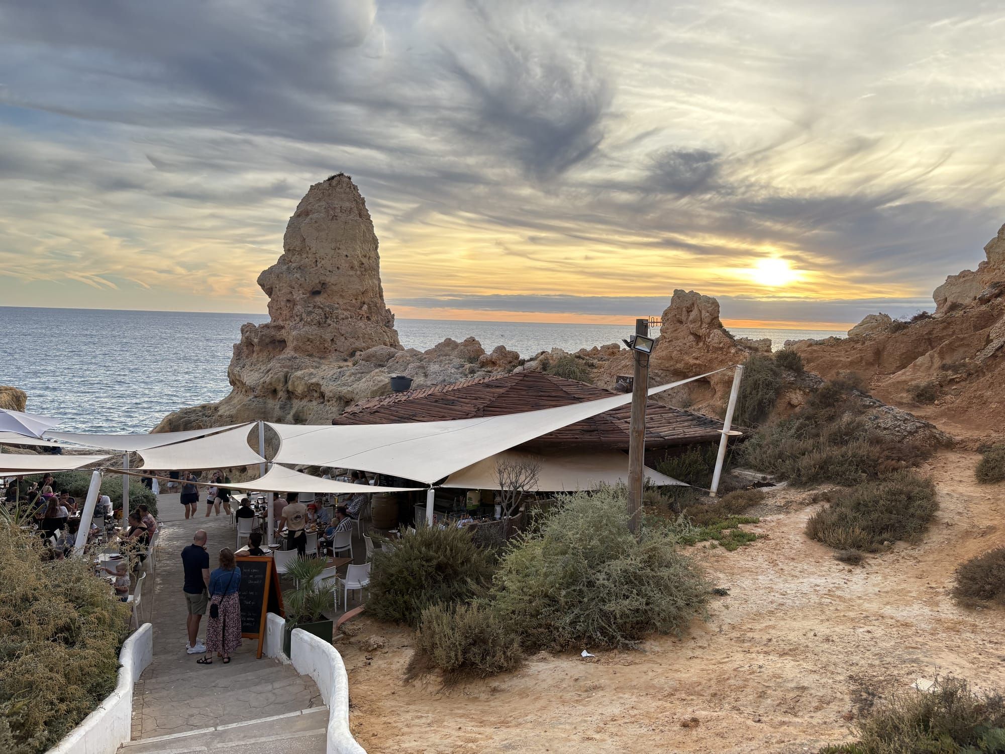 Carvoeiro's ochre cliffs in late-afternoon light, Algarve