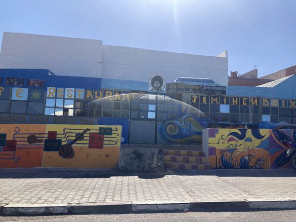 A group yoga session on the Atlantic beach at the close of the Douar Noujoum retreat — Essaouira, Morocco