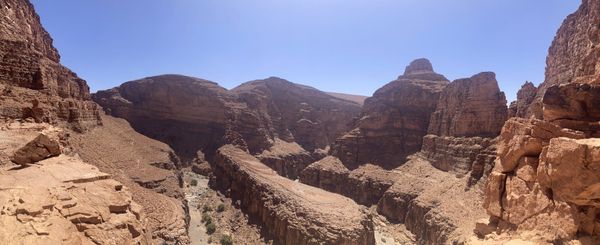A panoramic view over the vast red-stratified canyons of the southern Anti-Atlas — Tarhjicht area, Morocco