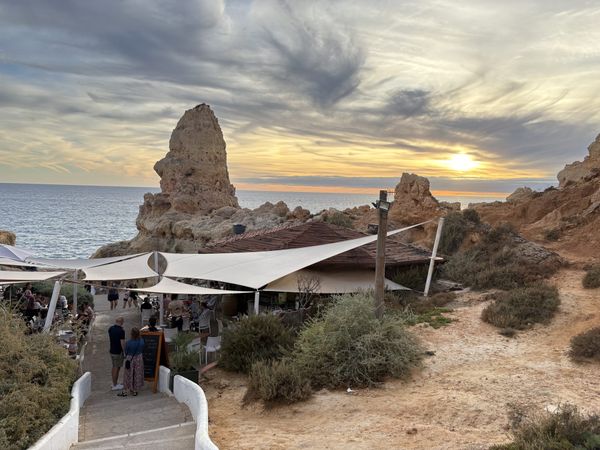 Carvoeiro's ochre cliffs in late-afternoon light, Algarve