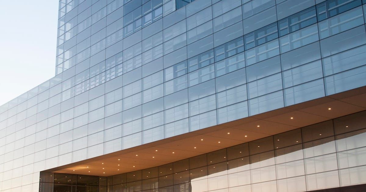 Exterior of a modern bank building, illustrating FirstRand's banking operations